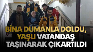 Bina dumanla doldu, yaşlı vatandaş taşınarak çıkartıldı